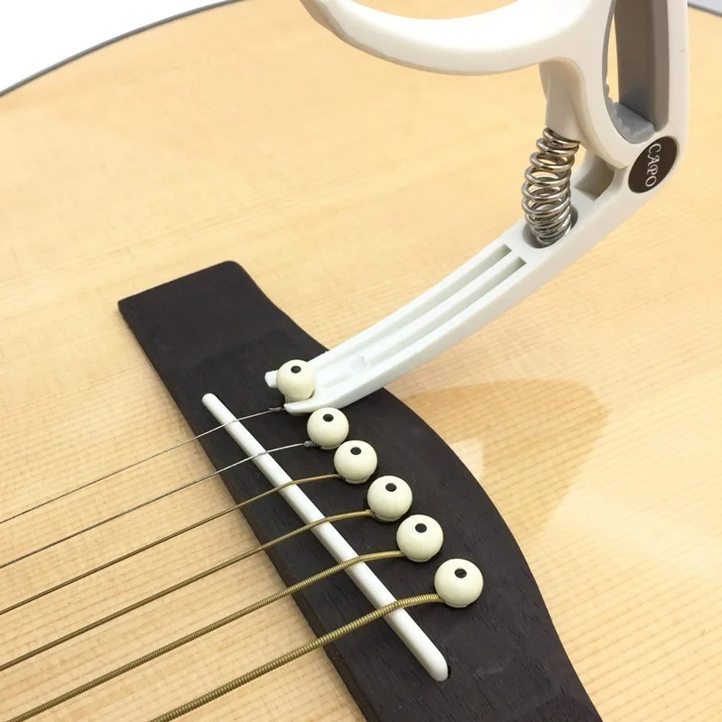 Пластиковый каподастр для 6-ст – обзор и цена Musical Instrument Dulcimer